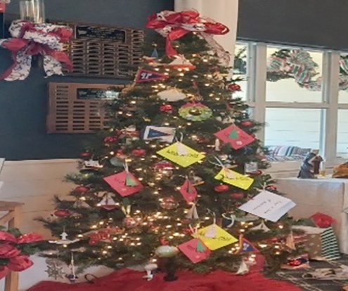 PPYC Tree of Giving decorated with tags for the Adopt a Child program